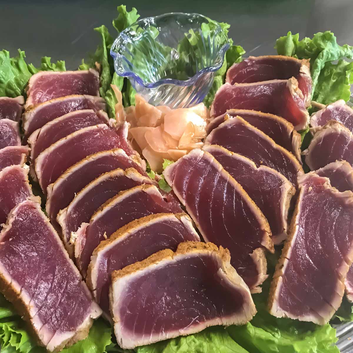 Ahi sashimi on a bed of butter lettuce