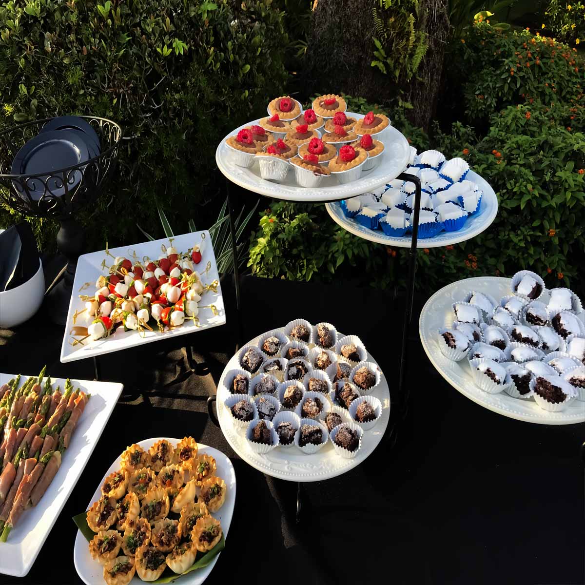 Stacked Platters of Deserts and pupu apps