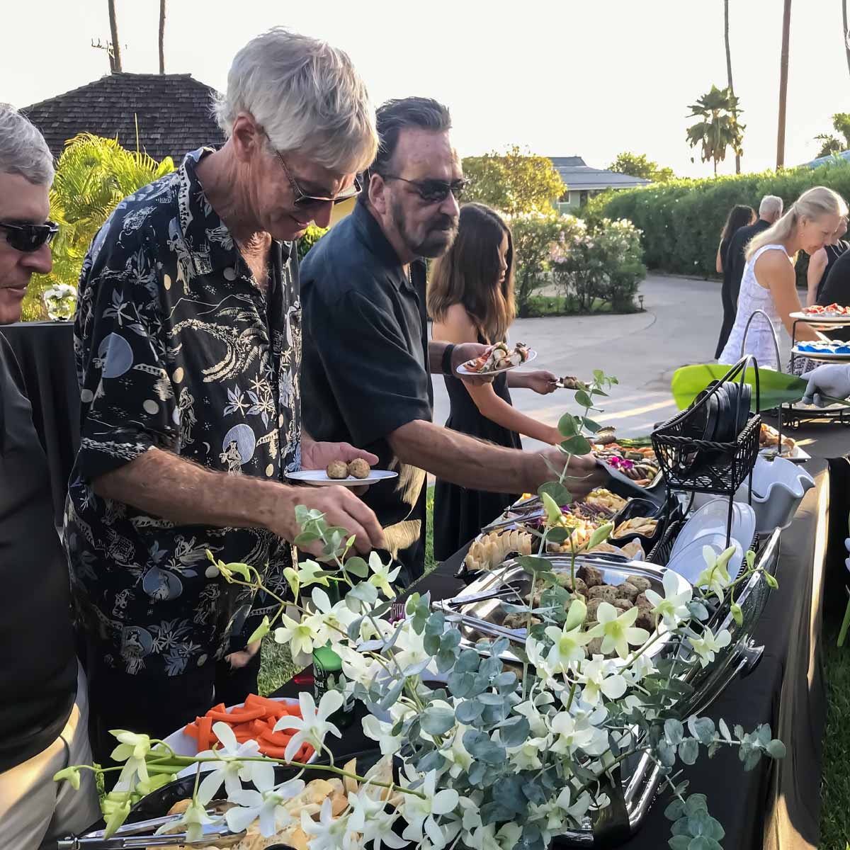 People load up on food at a celebration